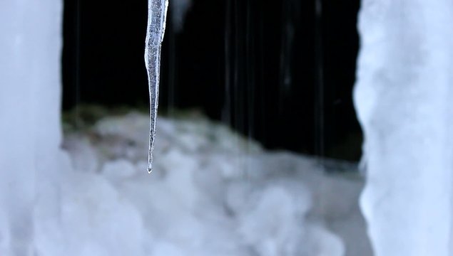 Icicles and flowing water