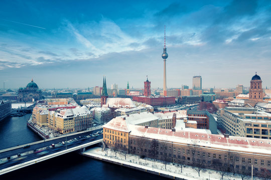 Berlin Skyline Winter City Panorama with snow and blue sky