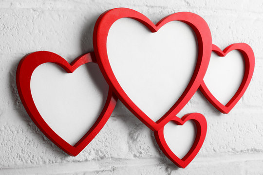 heart picture frame on white wall