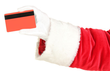 Santa Claus hand holding red credit card isolated on white