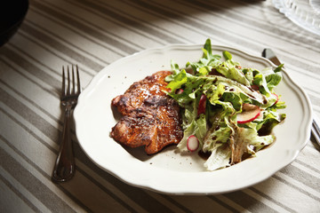 Roasted meat with salad