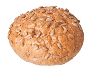 Round sandwich bun with sunflower seeds isolated on white backgr