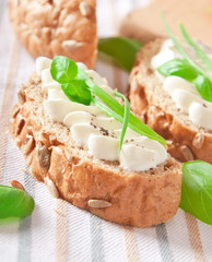 sandwich with cream cheese, basil and green garlic 