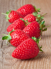 Fresh strawberries on wooden table