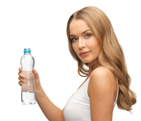 young beautiful woman with  bottle of water