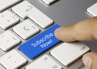 Subscribe Now! keyboard key. Finger