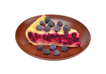 Blackberry pie in on brown plate, isolated on white background