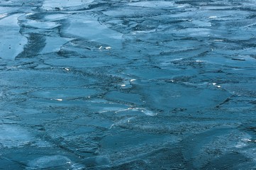 Frozen ice on a lake at winter