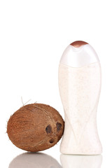 coconut scrub in bottle and coconut isolated on  white