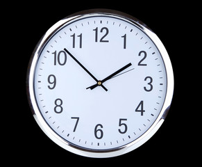 round office clock on black background