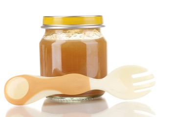 Useful and tasty baby food with beige small fork isolated