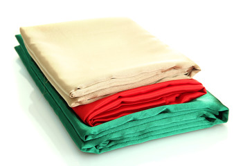 heap of cloth fabrics isolated on white