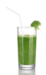 Green vegetable juice in glass isolated on white