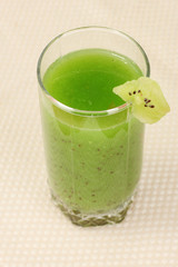 Green juice on light background