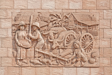 Sandstone carving decorated on the wall at temple in Bangkok,Tha