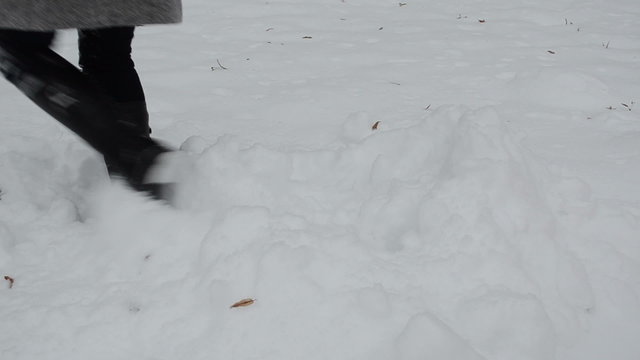 woman legs get out winter snowdrift snow