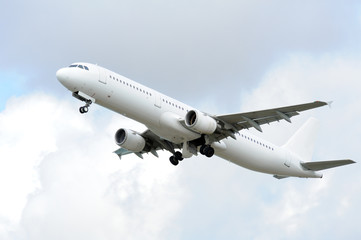 Fototapeta na wymiar Passenger airplane takeoff from active runway