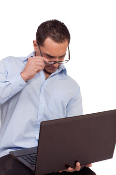 Man battling to read his laptop screen