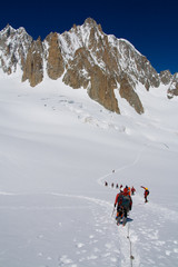 Naklejka na ściany i meble Alpiniści na lodowiec Mer de Glace