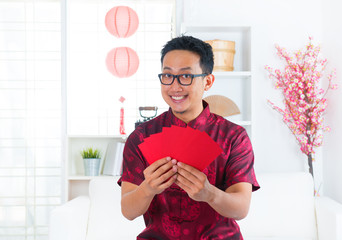 Southeast Asian Chinese man indoors