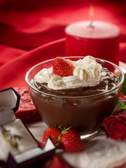 chocolate mousse  red roses and diamond ring, selective focus
