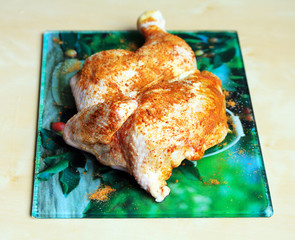 Raw chicken legs with spices