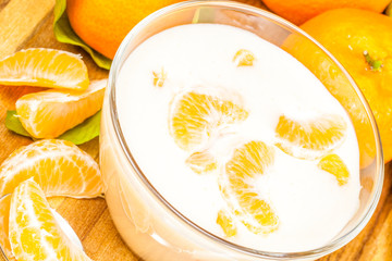 Orange  mandarin Yoghurt in the glass