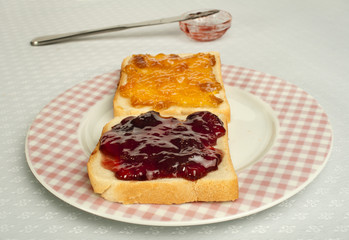 Spread jam on bread
