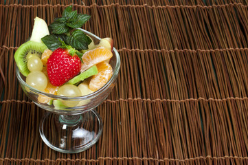 Fruit salad in a glass bowl