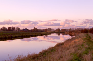 Fototapeta na wymiar colorful sunset on canal