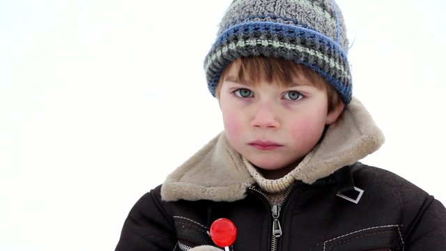 boy eating candy,boy licks Chupa Chups