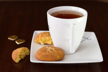 cinnamon cookies with cup of tea