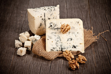 Blue cheese on wooden table