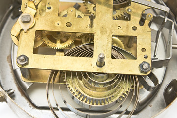 Inside mechanism of old alarm clock