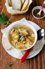 Meat soup with dumplings
