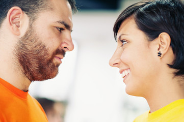 Young couple looking at each others.