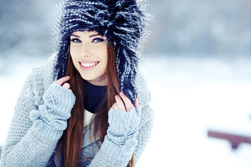Young woman winter portrait. Shallow dof.