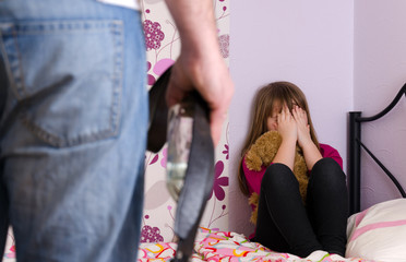 Scared daughter because of father anger after alcohol drinking