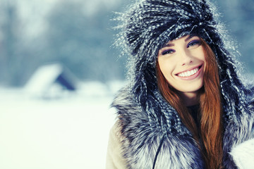 Young woman winter portrait. Shallow dof.