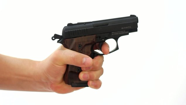 Hand with gun, on white background