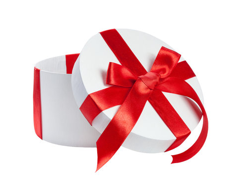 white gift box with red ribbon