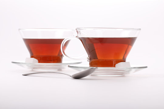 two elegant cups of black tea