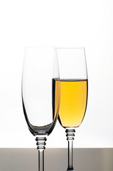 Two glasses of champagne or wine isolated on white