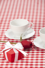 Valentines day - cup of coffee or cappuccino with chocolates 