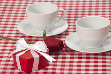 Valentines day - cup of coffee or cappuccino with chocolates 