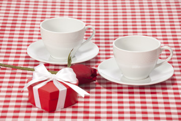 Valentines day - cup of coffee or cappuccino with chocolates 