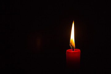 One lit candle