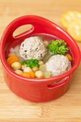 Homemade soup with meatballs