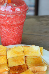 Storm berry smoothie and toast, butter, milk