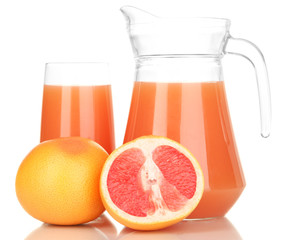Full glass and jug of grapefruit juice and grapefruits isolated